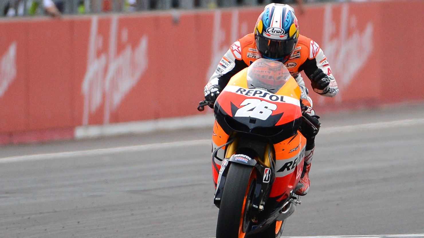Dani Pedrosa clenches his fist after taking the checkered flag in the Japan MotoGP at Motegi.