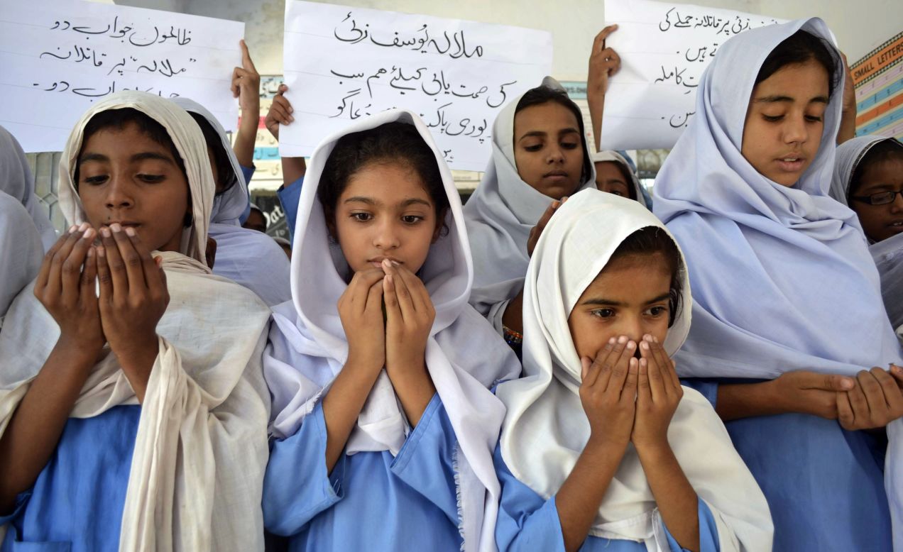 Pakistani school girls pray for the Malala's recovery. Over the weekend, the teen moved her limbs after doctors "reduced sedation to make a clinical assessment," military spokesman Maj. Gen. Asim Bajwa said.