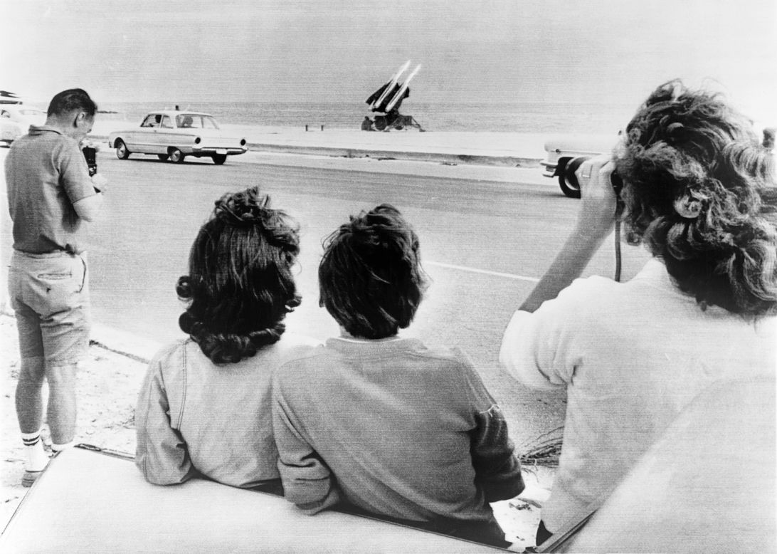 Onlookers gather on George Smathers Beach in Key West, Florida, to see the U.S. Army's Hawk anti-aircraft missiles positioned there during the Cuban missile crisis.