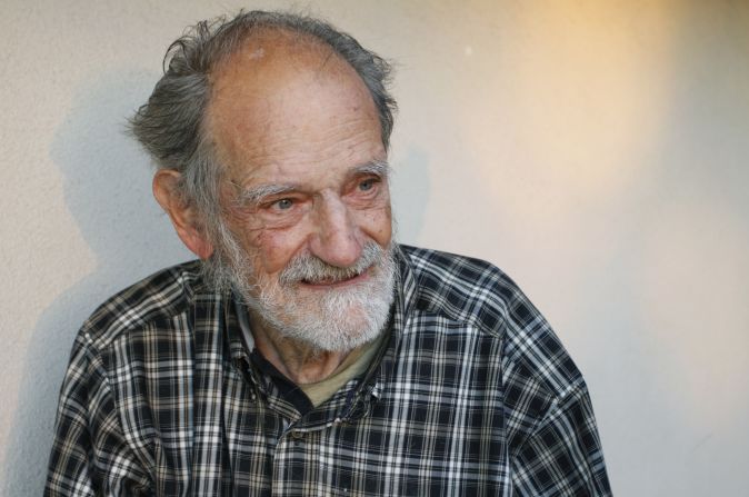 U.S. economist Lloyd Shapley smiles outside his home in Los Angeles after being notified that he won the 2012 Nobel Memorial Prize for Economics on Monday, October 15. He and Alvin Roth share the award for their work in market design and matching theory.