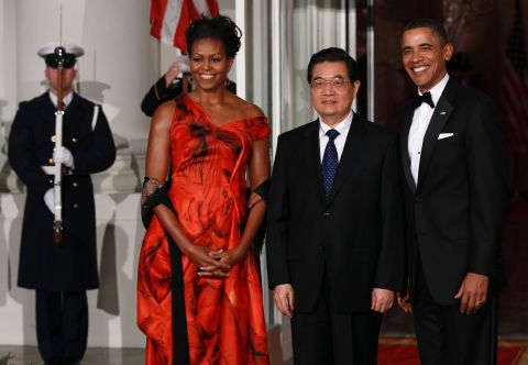 Michelle Obama received criticism for her Alexander McQueen gown at the White House state dinner with President Hu Jintao. The First Lady's critics scrutinized her decision to wear a British designer instead of a Chinese one.