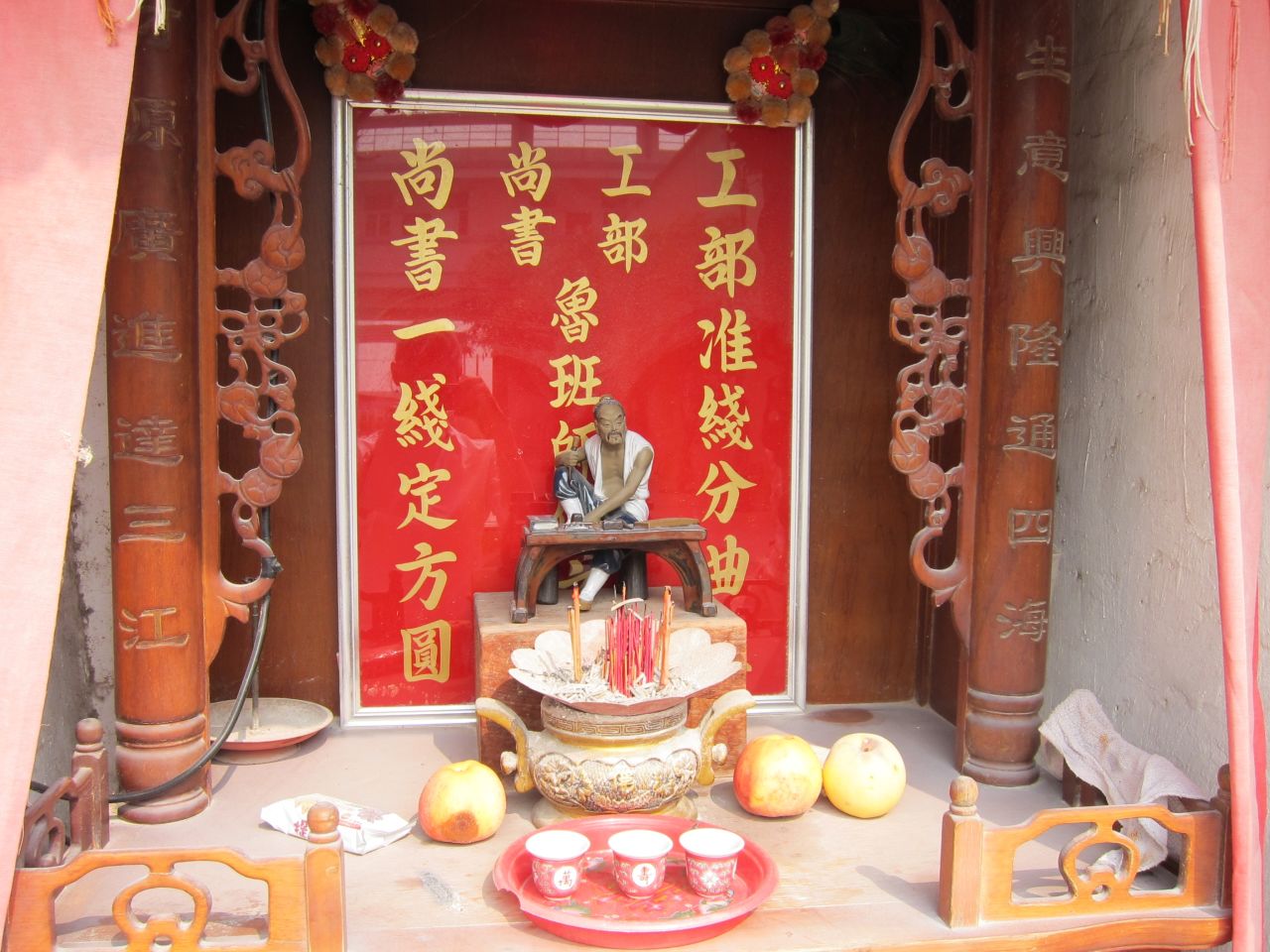 A shrine dedicated to Lu Ban, the "patron saint" for Chinese builders and construction workers, stands at the heart of the shipyard
