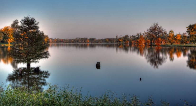 <a href="http://ireport.cnn.com/docs/DOC-853145">Jacobson Park Reservoir</a> reflects the fall trees around its smooth surface.