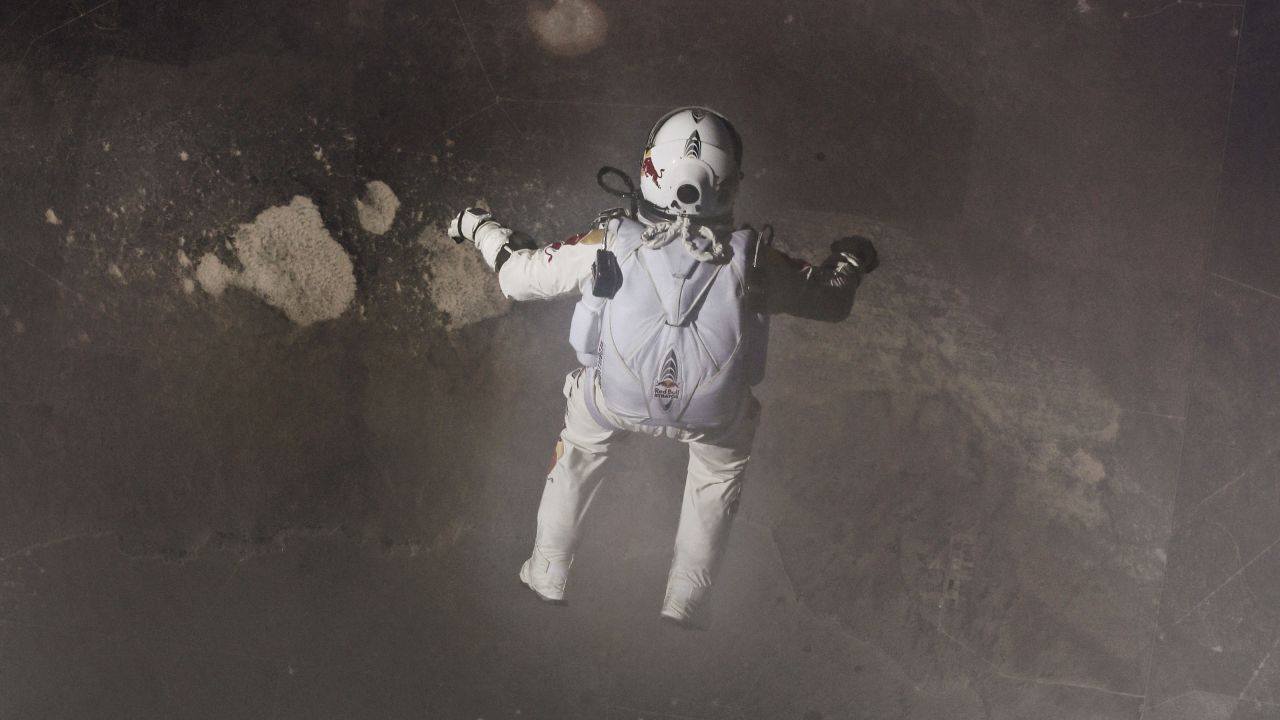 Baumgartner free-falls after stepping off the 24-mile high platform. He reached speeds of more than 830 mph, breaking the sound barrier.