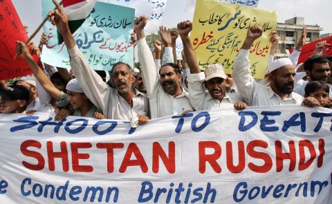 Activists chant anti-British slogans during a protest against Salman Rushdie's "Satanic Verses" in 2007. Alam says despite the fact Rushdie is British, Pakistanis protested the publishing of his book outside the American Center in Islamabad in 1989. 