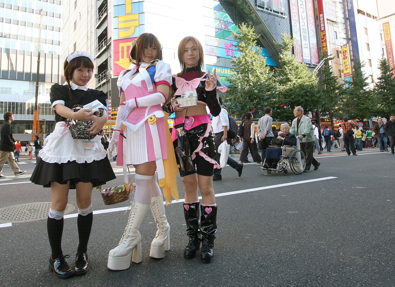 Maid costumes and other fantasy-infused outfits are mixed with electronics in Tokyo's Akihabara area.