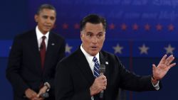 US President Barack Obama listens to the Republican Presidential candidate Mitt Romney during the second presidential debate, the only held in a townhall format, at Hofstra University in Hempstead, New York, on Tuesday, October 16.