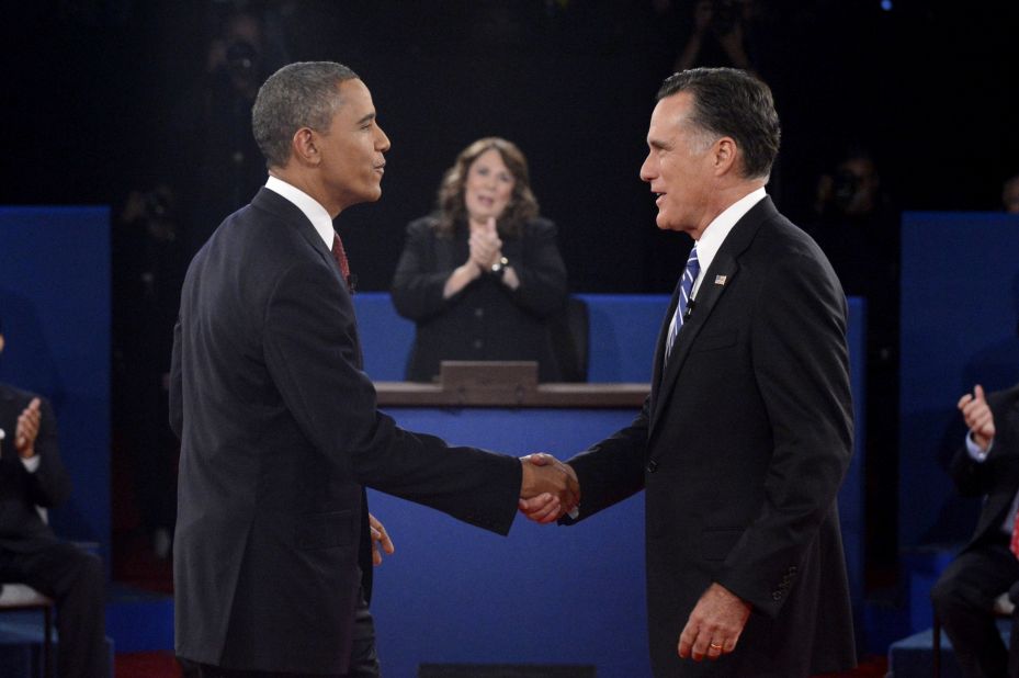President Obama and Republican presidential candidate Romney shake hands before the start of the debate.