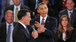 US President Barack Obama and Republican presidential candidate Mitt Romney soeak over each other during the second presidential debate Tuesday, October 16, at Hofstra University in Hempstead, New York.