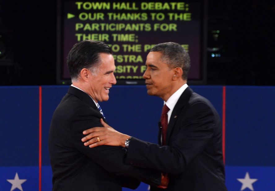Republican presidential candidate Mitt Romney and U.S. President Barack Obama shake hands following the second presidential debate at Hofstra University in Hempstead, New York, on Tuesday, October 16, moderated by CNN's Candy Crowley. <a href="http://www.cnn.com/2012/10/03/politics/gallery/first-presidential-debate/index.html">See the best photos of the first presidential debate.</a>