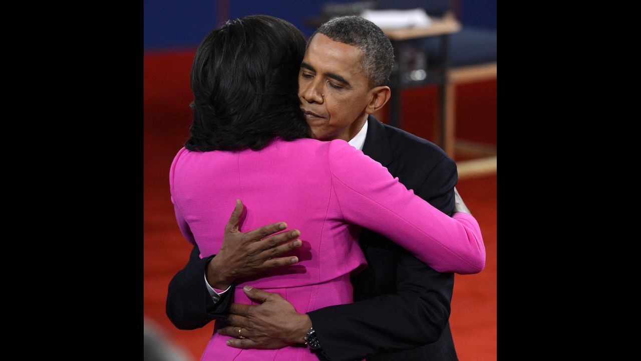 President Obama and first lady Michelle Obama embrace after the debate.