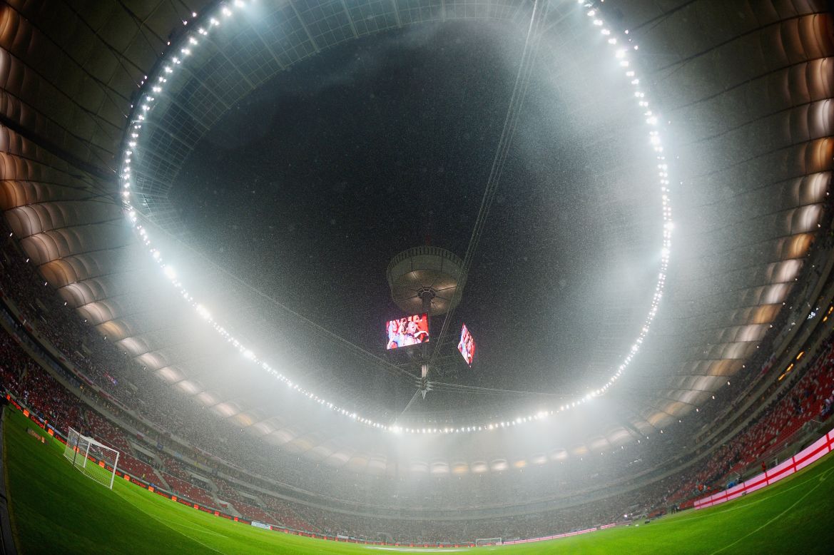 The roof ot the national stadium in Warsaw remained open on Tuesday as heavy rain put pay to any hopes of England's World Cup qualifier against Poland taking place at the first time of asking.