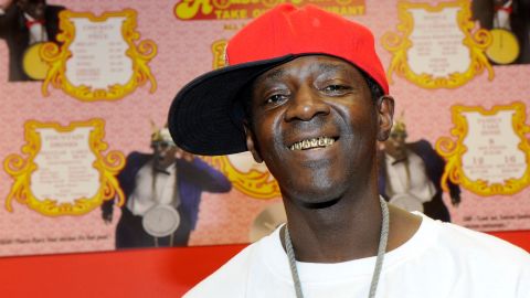 Flavor Flav poses at  his Flavor Flav House of Flavor Take Out Restaurant on March 14, 2012 in Las Vegas, Nevada. 