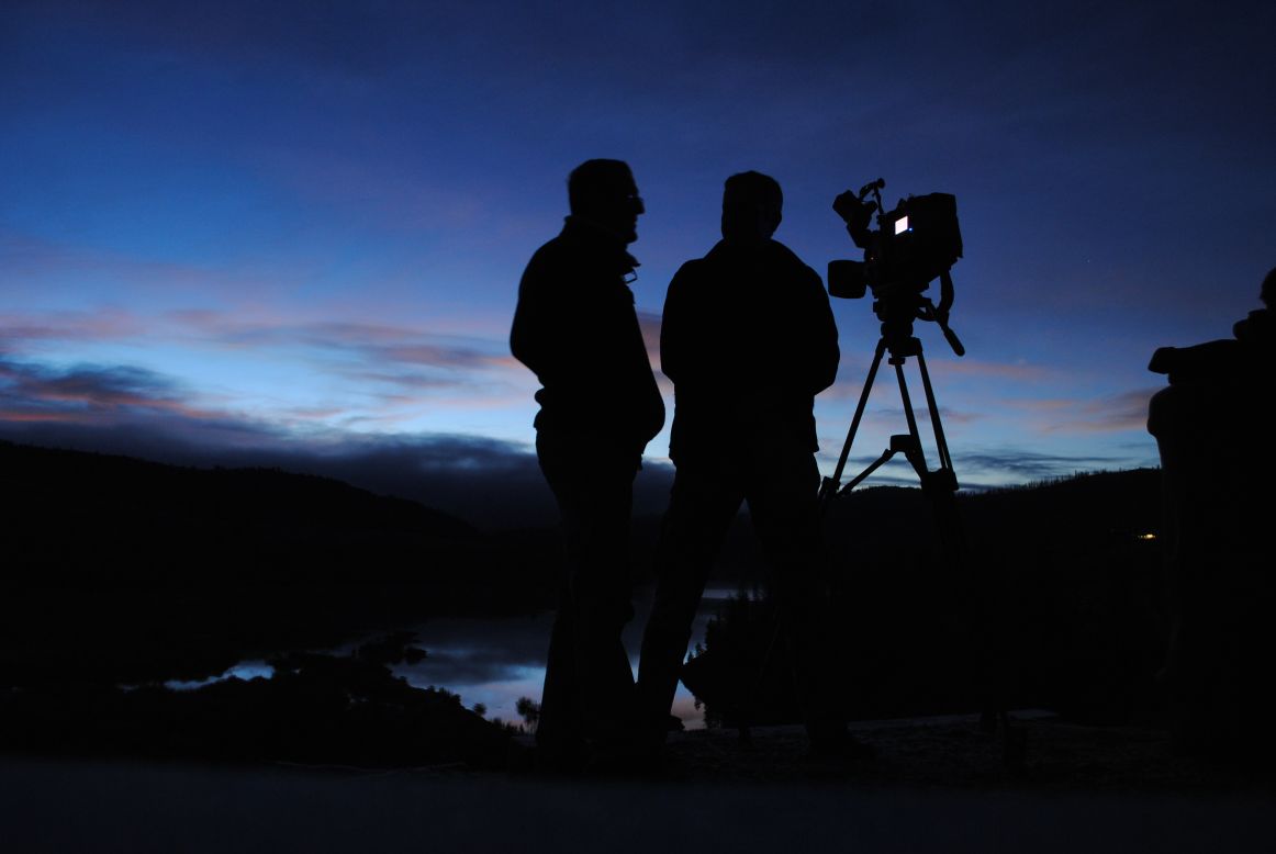 Richard Quest and cameraman Christian Streib watch the sun rise over Granby, Colorado.