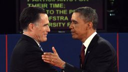 US President Barack Obama and Republican Presidential nominee Mitt Romney shake hands on October 16, 2012 at the end of the second of three presidential debates at Hofstra University in Hempstead, New York. AFP PHOTO/Saul LOEB (Photo credit should read SAUL LOEB/AFP/Getty Images) 