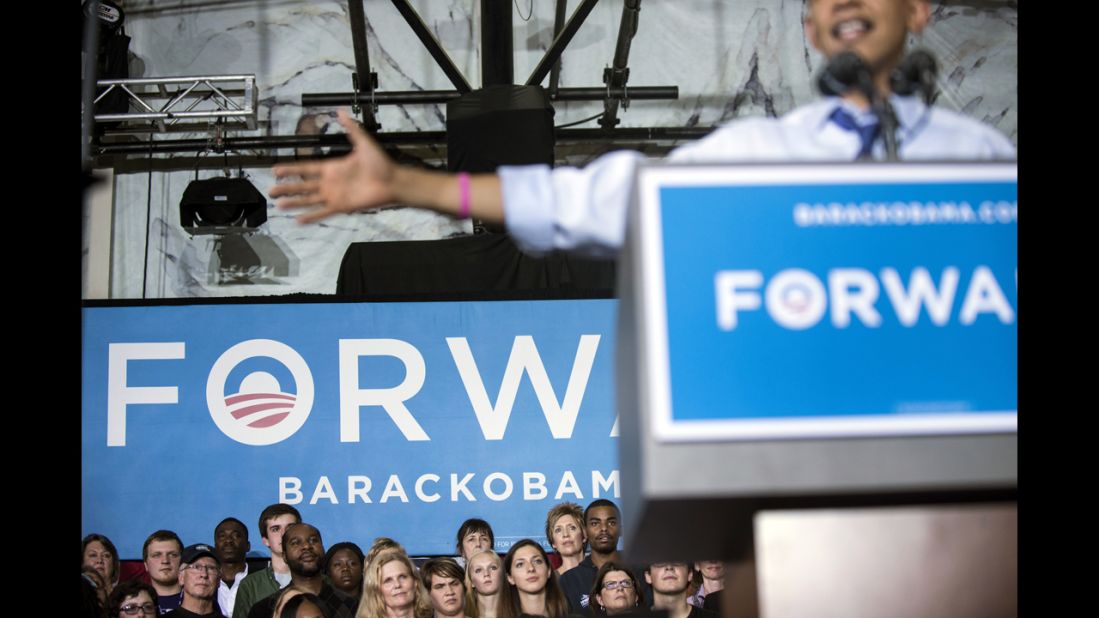 Supporters of Obama listen to him speak during a rally at Cornell College in Mt. Vernon, Iowa, on Wednesday.