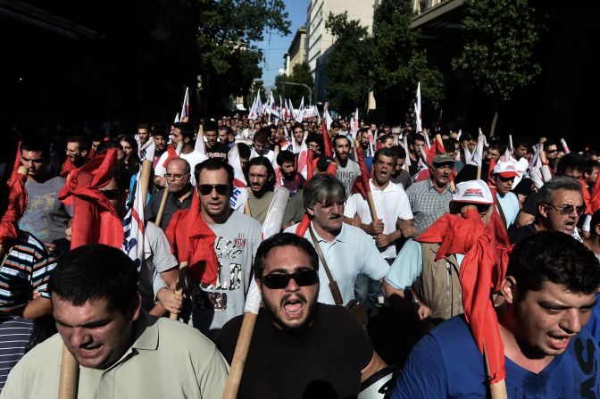 Demonstrators shout slogans during an anti-austerity rally in Athens.