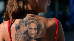 As MotoGP returns to Malaysia for the first time since the tragic death of Marco Simoncelli, the Italian's memory is very much to the fore of the sport. Here, a fan of the rider, shows her devotion with a tattoo in tribute to her hero who died following a fatal crash on October 23 2011.