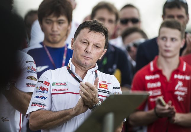 Fausto Gresini, team manager of San Carlo Honda Gresini, looks on struggling to hold back the tears. Simoncelli was the second rider Gresini has lost following the death of Japanese rider Daijiro Kato in a gruesome crash at Suzuka in 2003.