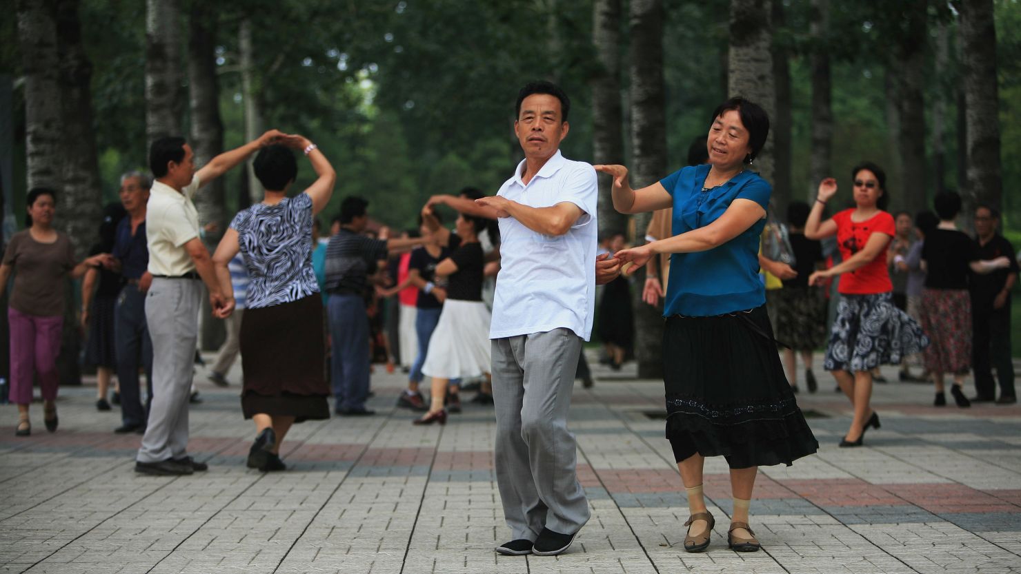 Beijing residents practice ballroom dancing in a park in Beijing, China. 