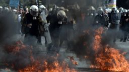 Riot police clash with demonstrators at an anti-austerity rally in Athens on October 18, 2012. The rally took place as workers across the country went on a 24-hour strike and EU leaders met to discuss the eurozone crisis.