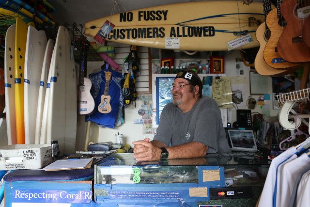 Surf shop owner Wayno Cochran tries to convince surfers to care about environmental issues.