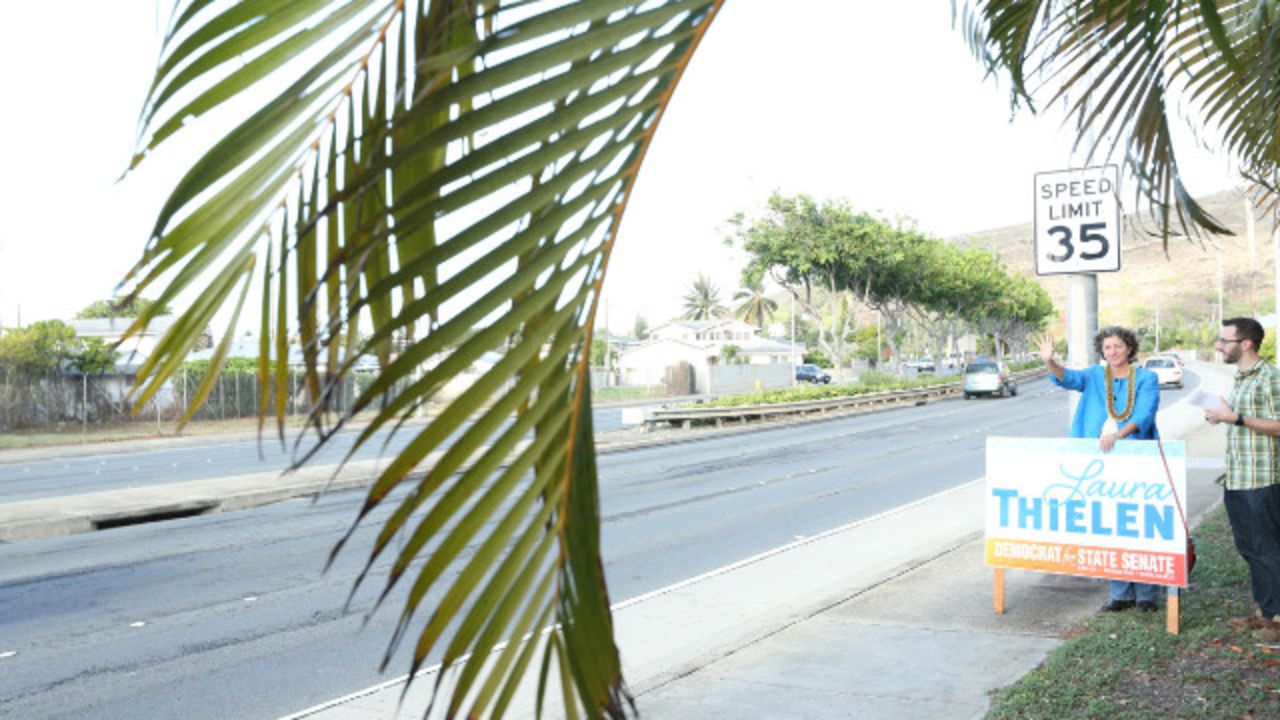 Hawaii bans billboards; so candidates stand by the road and wave to commuters.