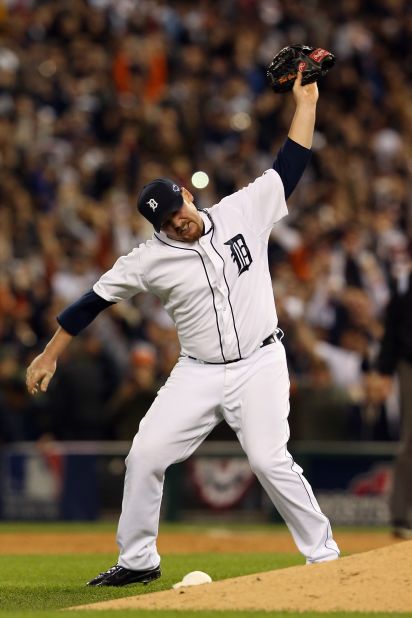 Tigers pitcher Phil Coke celebrates after the final out of Game 4 as the Tigers clinch the American League Championship and move on to the World Series.