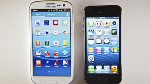 The Samsung Galaxy S III smartphone, left, beside its new rival, the iPhone 5.