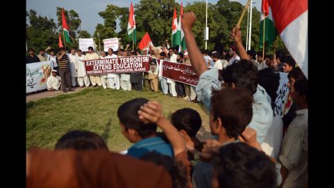 Pakistani demonstrators chant slogans during a protest against the assassination attempt by the Taliban on Tuesday in Islamabad, Pakistan.