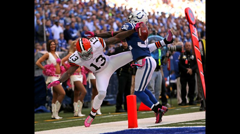 Cassius Vaughn of the Colts knocks T.Y. Hilton out of bounds on Sunday.