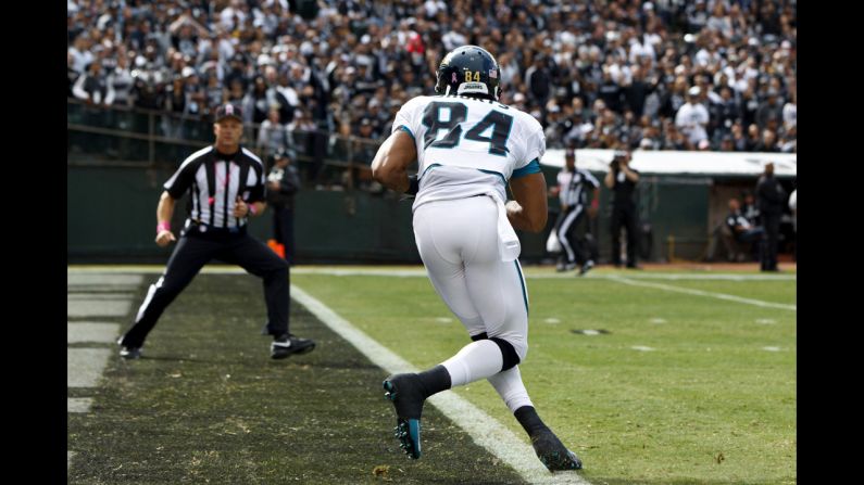 Cecil Shorts of the Jacksonville Jaguars scores a touchdown against the Oakland Raiders in the first quarter.