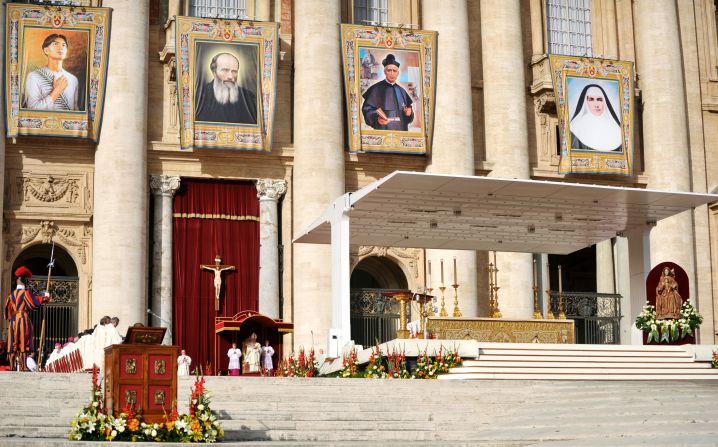 Pope Benedict XVI stands in front of St. Peter's Basilica on Sunday.