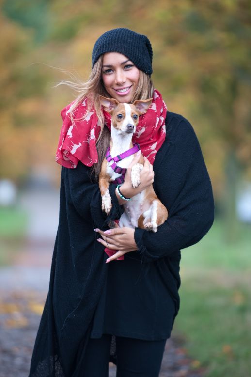 Leona Lewis snuggles with a puppy at the October 21 charity walk for the Hopefield Animal Sanctuary in Brentwood, England.