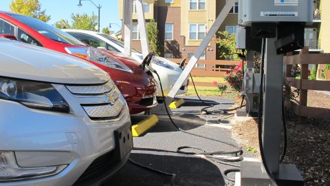 Several cars top off at an Atlanta charging station. Drivers say they hope more stations will mean more electric cars. 