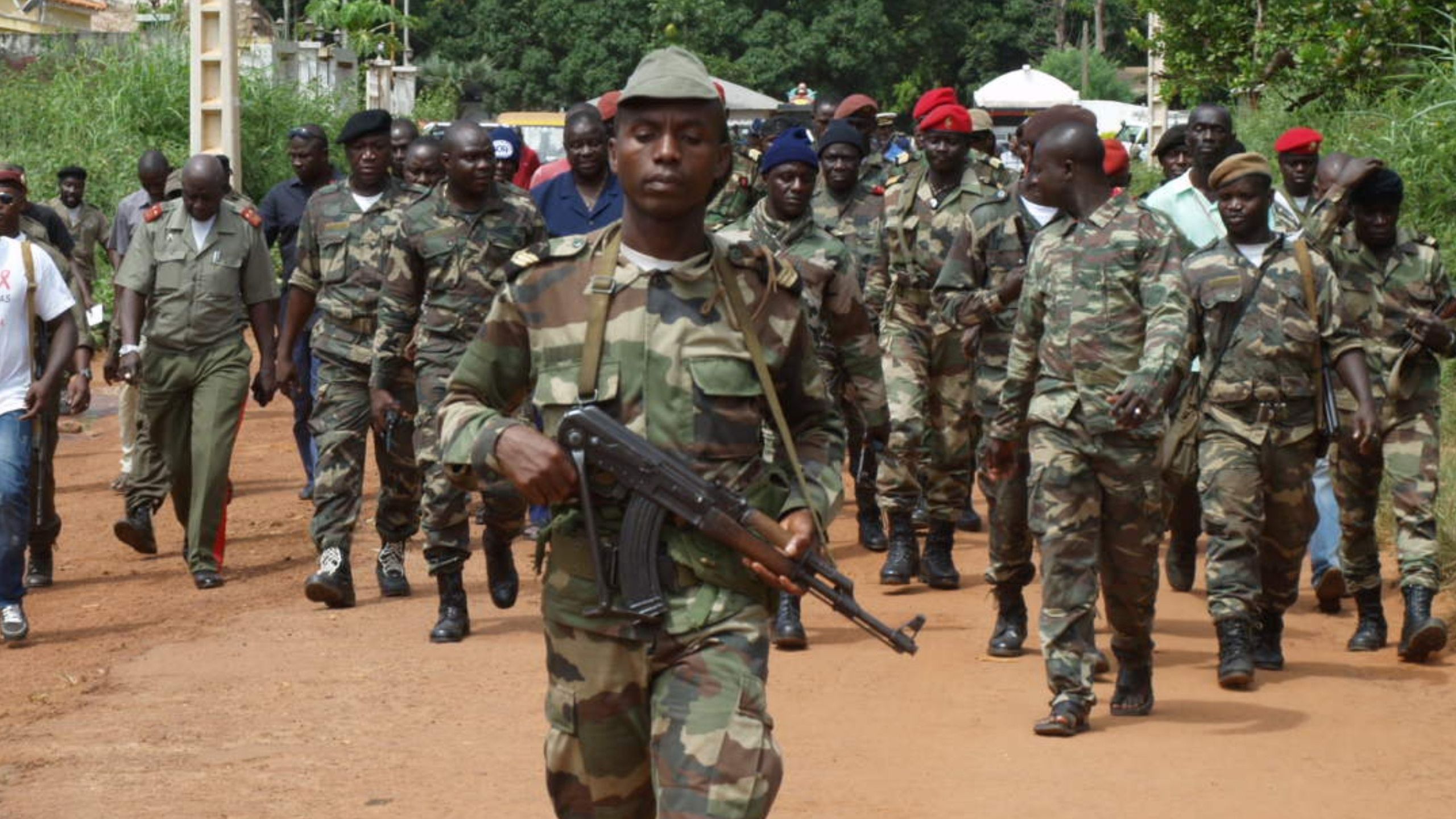 Soldiers walk in Guinea-Bissau's capital in 2012. 
