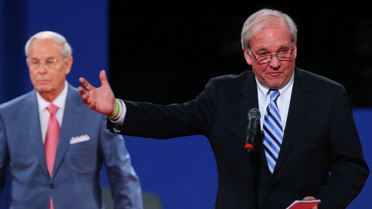 Co-chairmen Frank Fahrenkopf, left, and Mike McCurry of the Commission on Presidential Debates address the audience at Lynn University.