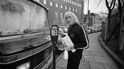 English dj and television presenter Jimmy Savile (1926 - 2011) with his motor home, 31st December 1969. (Photo by McCarthy.Daily Express/Hulton Archive/Getty Images)