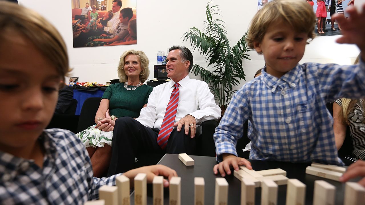 Romney and his wife, Ann, sit backstage with their family before the start of Monday's debate with President Obama. It was the candidates' final showdown before Election Day on November 6. <a href="http://www.cnn.com/2012/10/16/politics/gallery/second-presidential-debate/index.html">See the best photos from the second presidential debate.</a>