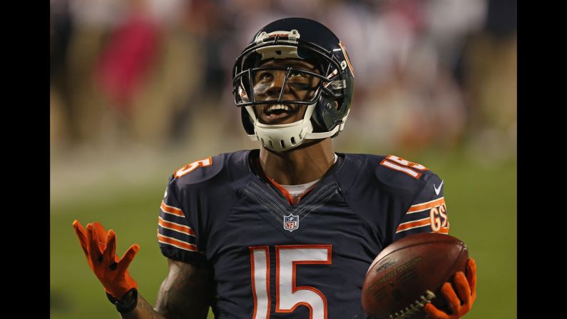 No. 15 Brandon Marshall of the Bears celebrates a first quarter touchdown catch against the Lions.
