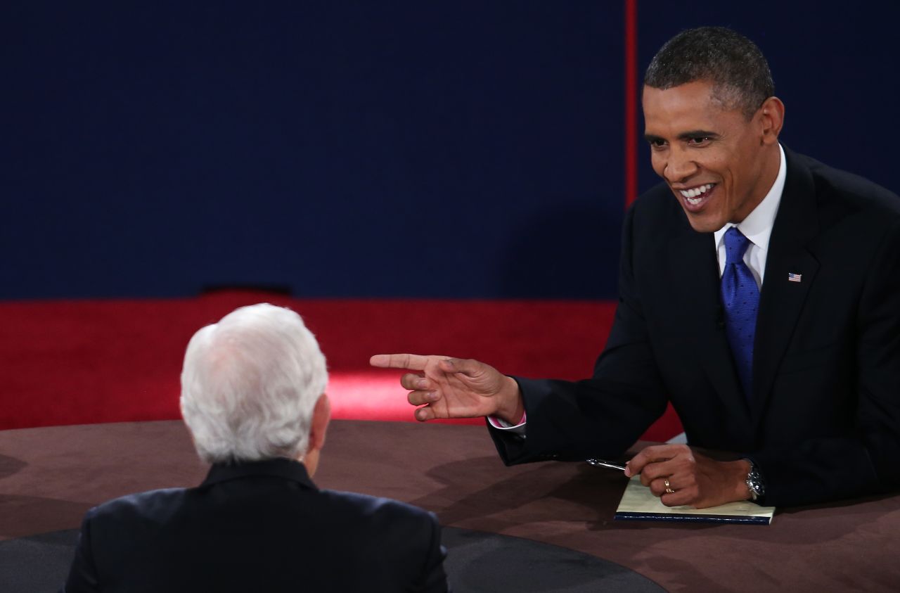Obama looks to Schieffer while debating Romney.