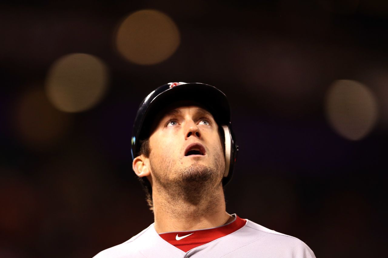 No. 23 David Freese of the Cardinals reacts after flying out in the fourth inning.