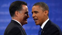 US President Barack Obama (R) hugs Republican presidential candidate Mitt Romney at the end of the third and final presidential debate at Lynn University in Boca Raton, Florida, on October 22, 2012. The showdown focusing on foreign policy is being held in the critical toss-up state of Florida just 15 days before the election and promises to be among the most watched 90 minutes of the entire 2012 campaign. AFP PHOTO/Jewel Samad        (Photo credit should read JEWEL SAMAD/AFP/Getty Images)