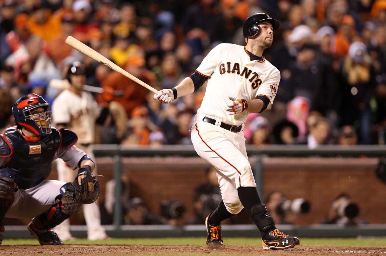 Brandon Belt of the San Francisco Giants hits a solo home run in the eighth inning against the St. Louis Cardinals in Game Seven of the National League Championship Series on Monday, October 22 in San Francisco. The winner of this game will face the Detroit Tigers in the 2012 World Series. <a href="http://www.cnn.com/2012/10/21/worldsport/gallery/nlcs-game-6/index.html" target="_blank">Look back at Game Six of the NLCS.</a>