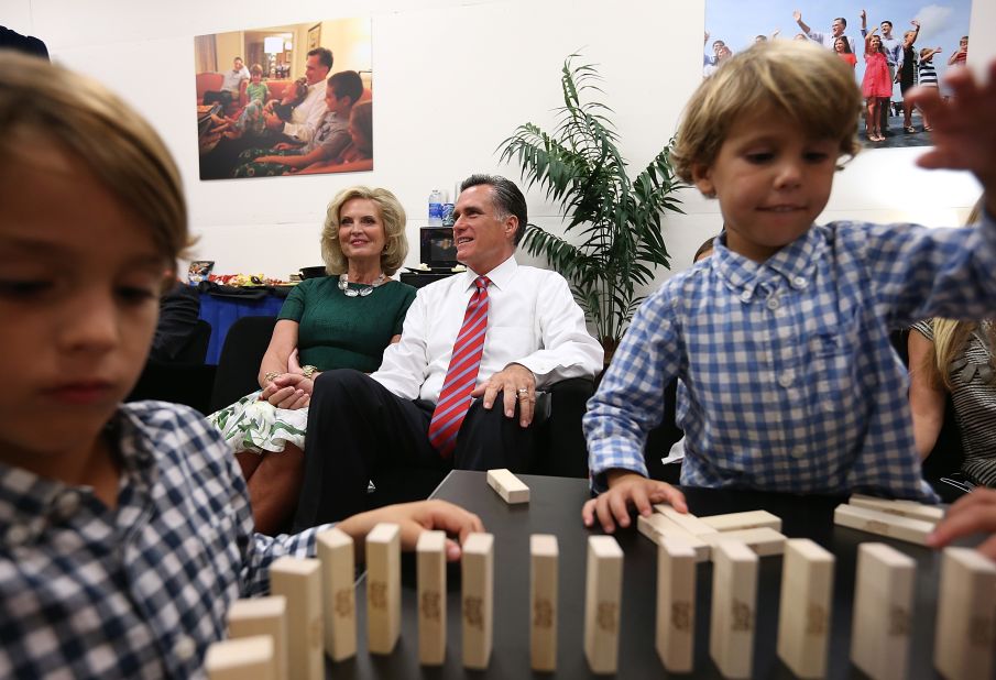 Romney and his wife, Ann, try to relax backstage with members of their family before the start of Monday's debate.