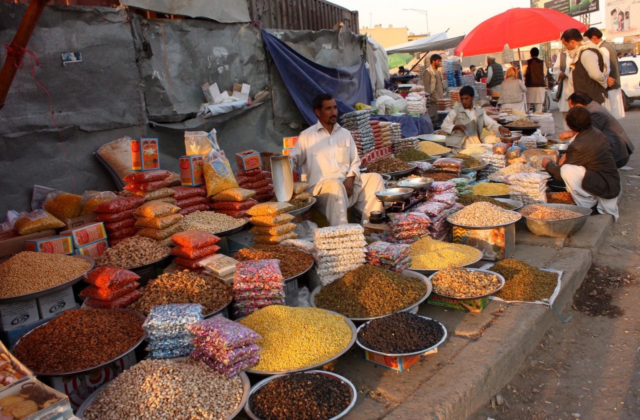 An Afghan man sells dried fruits on a roadside in Kabul, Afghanistan, on Wednesday, October 24. 