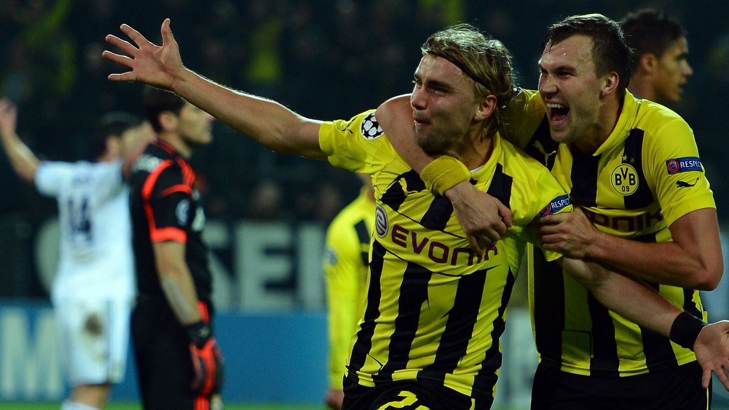 Dortmund's Marcel Schmelzer celebrates his decisive goal with Kevin Grosskreutz as the Germans beat nine-time champions Real Madrid 2-1. 