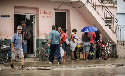 Citizens of Bayamo, Cuba, buy food on  Wednesday, as they prepare for the arrival of Hurricane Sandy.