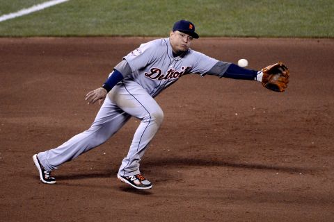 Miguel Cabrera of the Detroit Tigers dives for the ball to make a stop in the fourth inning.