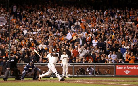 Pablo Sandoval, who hit three home runs, hits a single to center field off Al Alburquerque of the Detroit Tigers in the seventh inning during Game 1 of the Major League Baseball World Series at AT&T Park on October 24, 2012, in San Francisco, California.